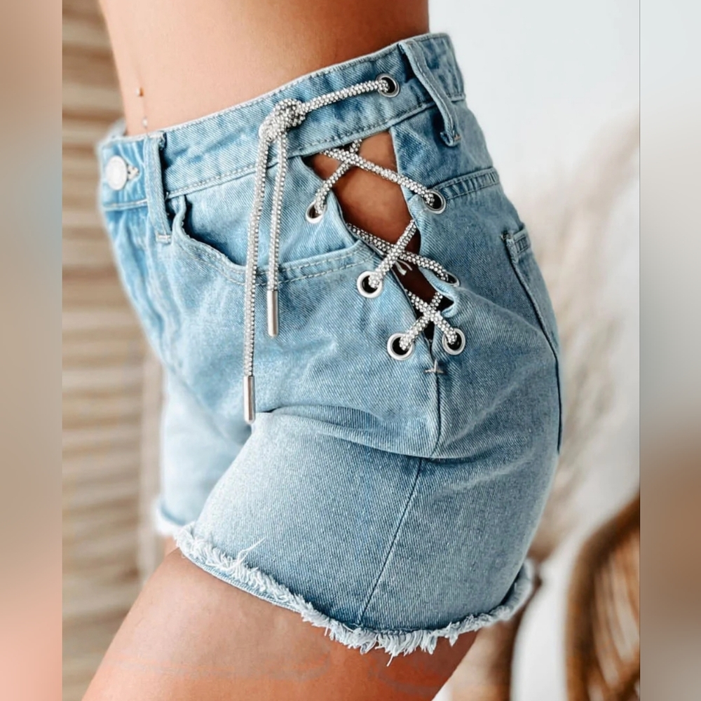 KNOWN TO FLAUNT IT RHINESTONE LACE-UP SHORTS